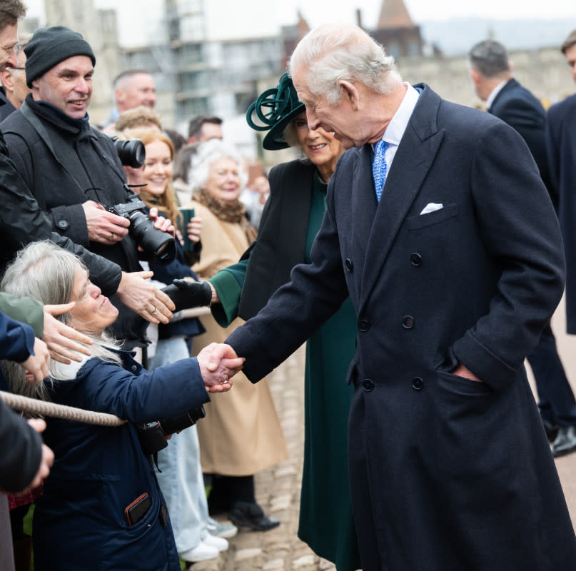 King Charles III and Queen Camilla meet well-wishers as they leave the Easter Service at Windsor Castle on March 31, 2024, in Windsor, England.<p>Samir Hussein/WireImage</p>