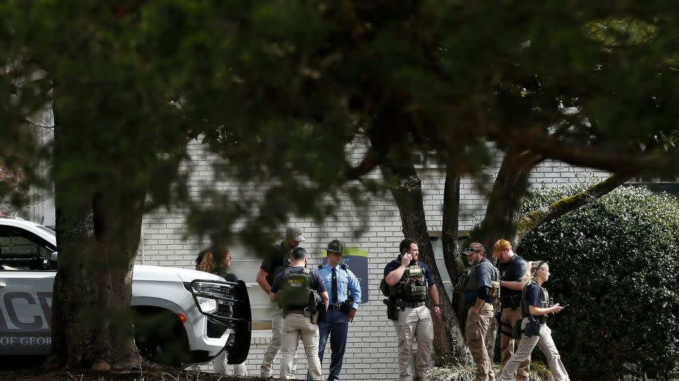 Law enforcement search an Athens apartment complex after executing a search warrant and taking Jose Antonio Ibarra into custody. - Joshua L. Jones/USA Today