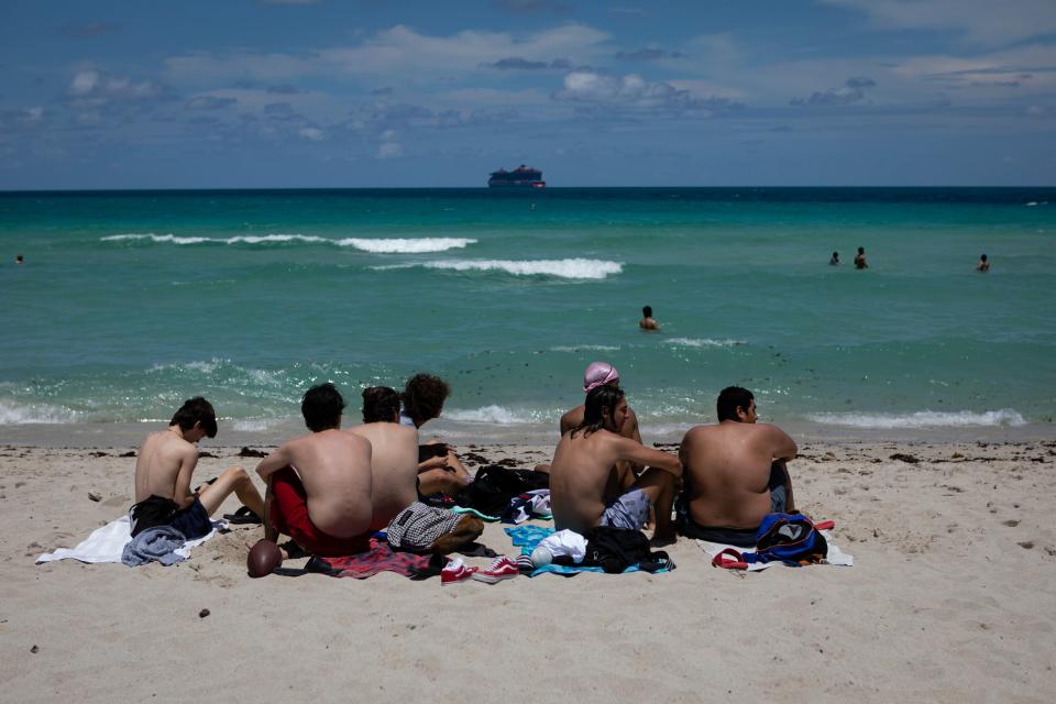 Beachgoers sunbathe in Miami Beach, Florida on June 16, 2020. (Eva Marie Uzcategui/AFP via Getty Images)