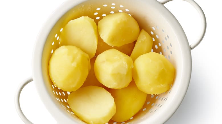 potatoes in a strainer