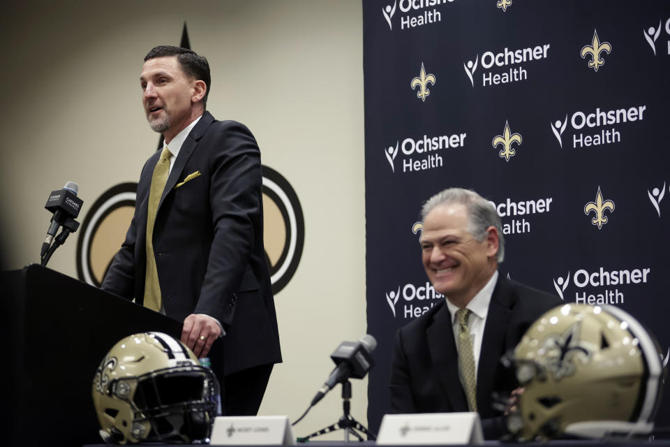 New Orleans Saints new head coach Dennis Allen speaks as general manager Mickey Loomis reacts during a news conference at the NFL football team's training facility, Tuesday, Feb. 8, 2022, in Metairie, La. (AP Photo/Derick Hingle)