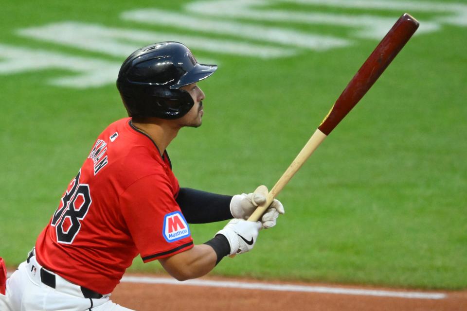 Aug 24, 2024; Cleveland, Ohio, USA; Cleveland Guardians left fielder Steven Kwan (38) hits a two-RBI double in the second inning against the Texas Rangers at Progressive Field. Mandatory Credit: David Richard-USA TODAY Sports