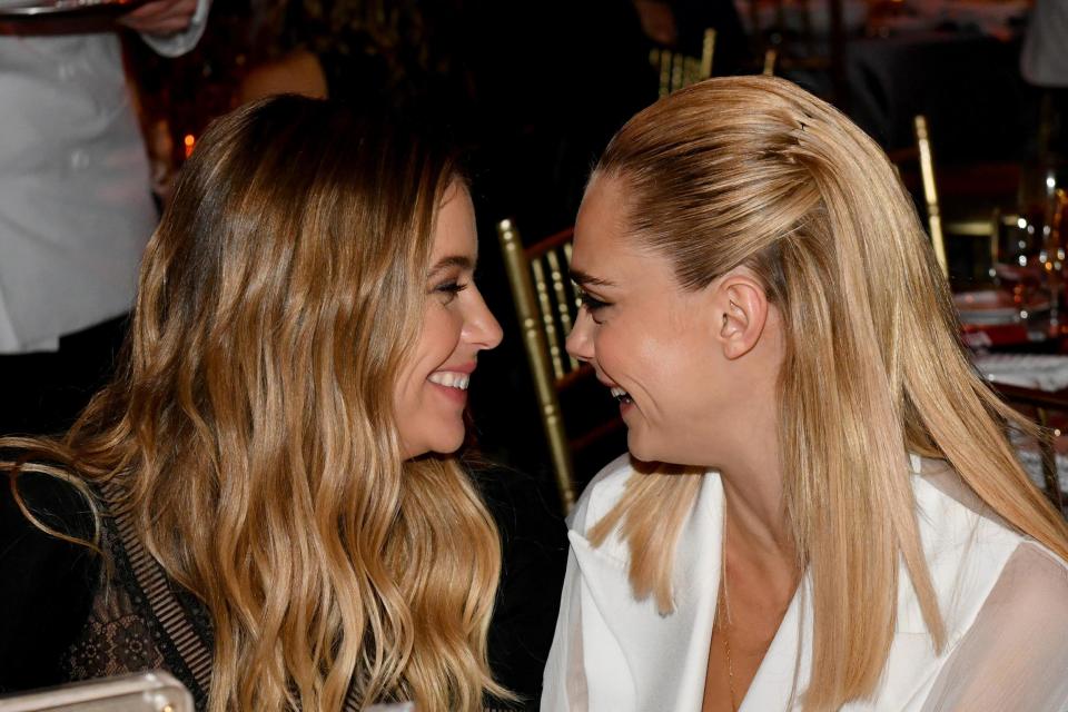 Cara Delevingne (right) with Ashley Benson (Getty Images)