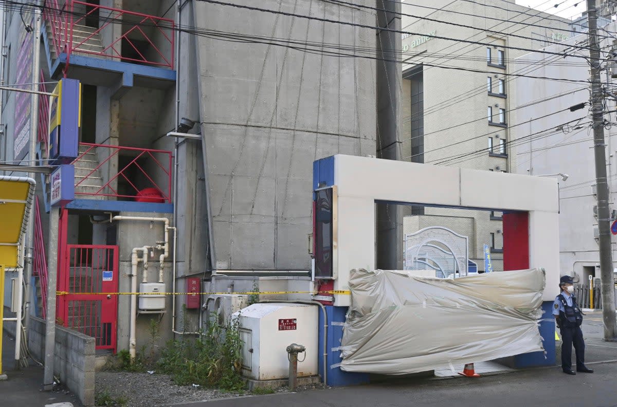 Hotel sealed in Sapporo, northern Japan after headless body of a man was discovered (AP)