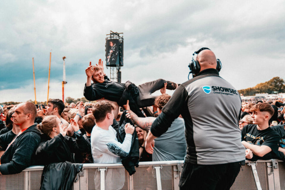 Horns up if you’re crowd surfing! (Picture: Stuart Garneys for Rolling Stone UK)