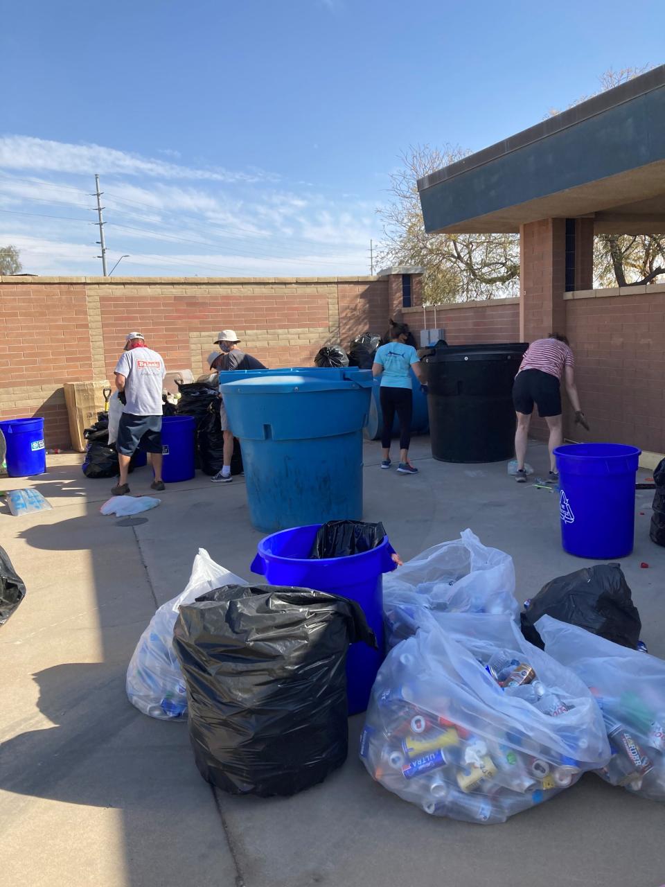 On Saturday mornings volunteers process plastic, tin and aluminum at Mesquite Elementary School, in Casa Grande. The city suspended its recycling services about four years ago.