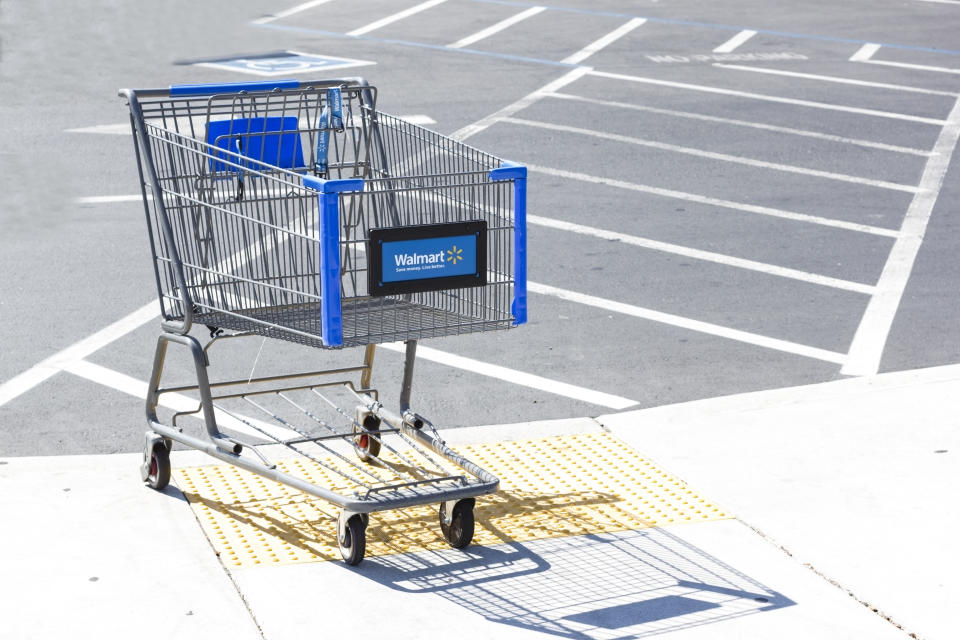 "Sacramento, USA - September 13, 2013: Walmart shopping cart on September 13, 2013 in Sacramento, California. Walmart is an American multinational retail corporation that runs chains of large discount department stores"