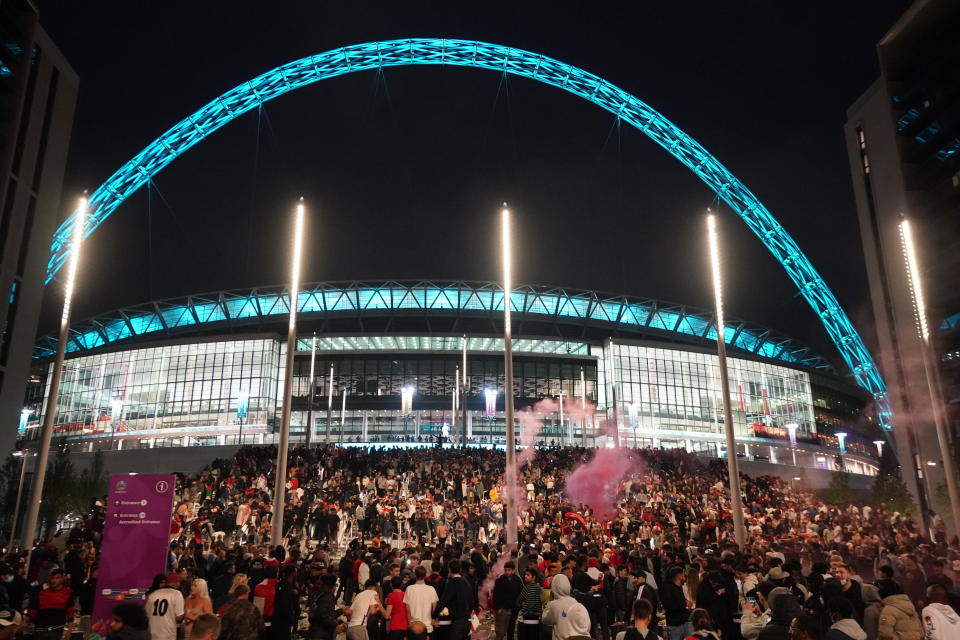 England fans outside the ground during the UEFA Euro 2020 Final at Wembley Stadium, London. Picture date: Sunday July 11, 2021.