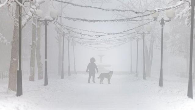 Sub-zero temperatures freeze girl's eyelashes in Siberia - Russia