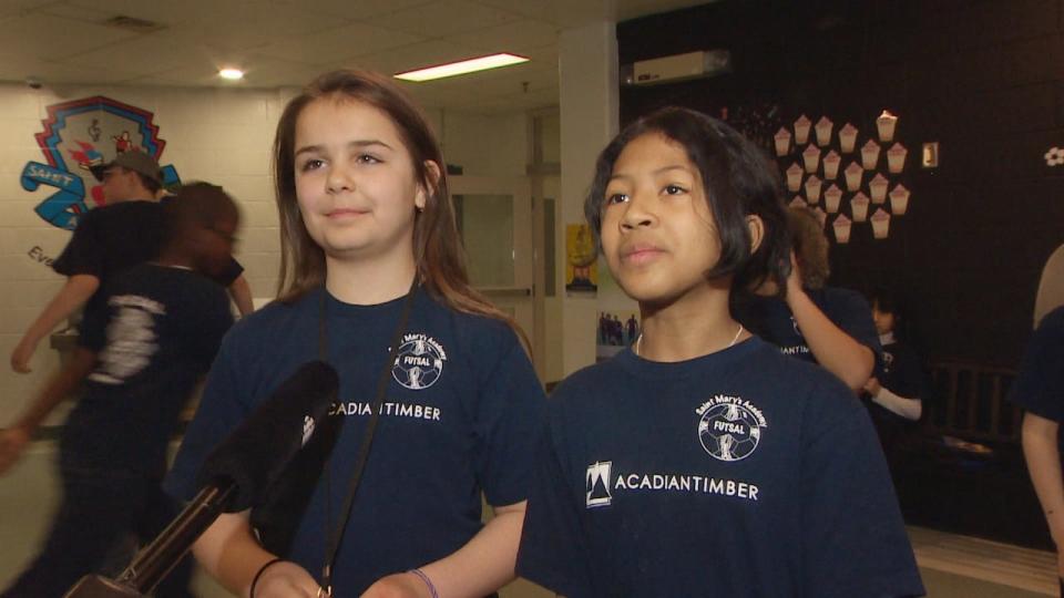 Saint Mary's Academy students Mali St Onge, left, and Heaven Rasalina played on their school's futsal team which practiced every Saturday. 