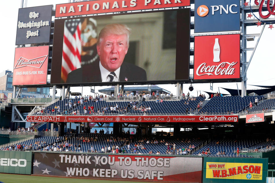 <p>A message from President Donald Trump is shown on the video board before the Congressional baseball game, Thursday, June 15, 2017, in Washington. (Photo: Alex Brandon/AP) </p>