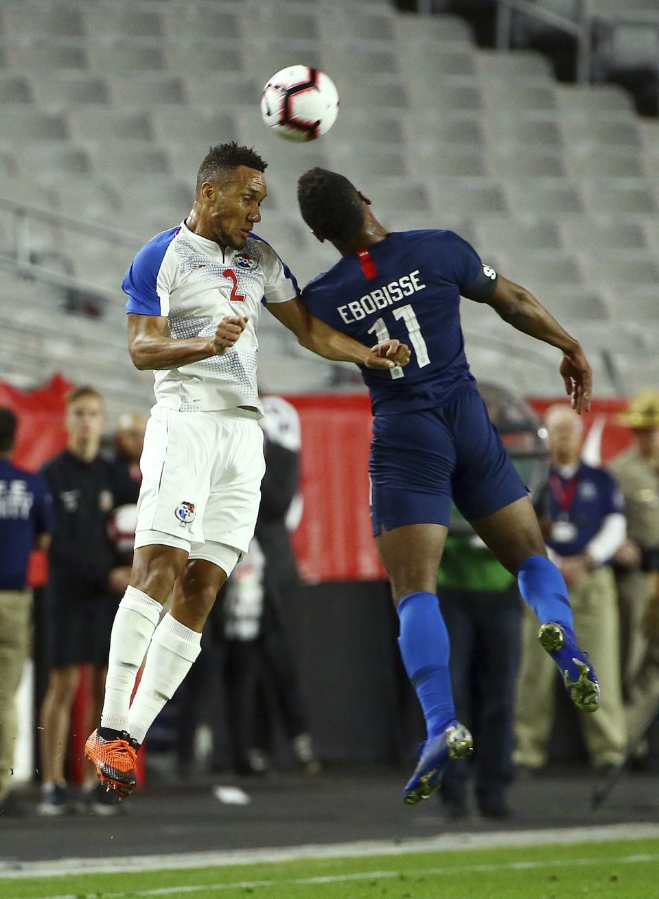 Panama defender Francisco Palacios (2) and United States forward Jeremy Ebobisse (11) arrives at the ball at the same time during the first half of a men's international friendly soccer match Sunday, Jan. 27, 2019, in Phoenix. (AP Photo/Ross D. Franklin)