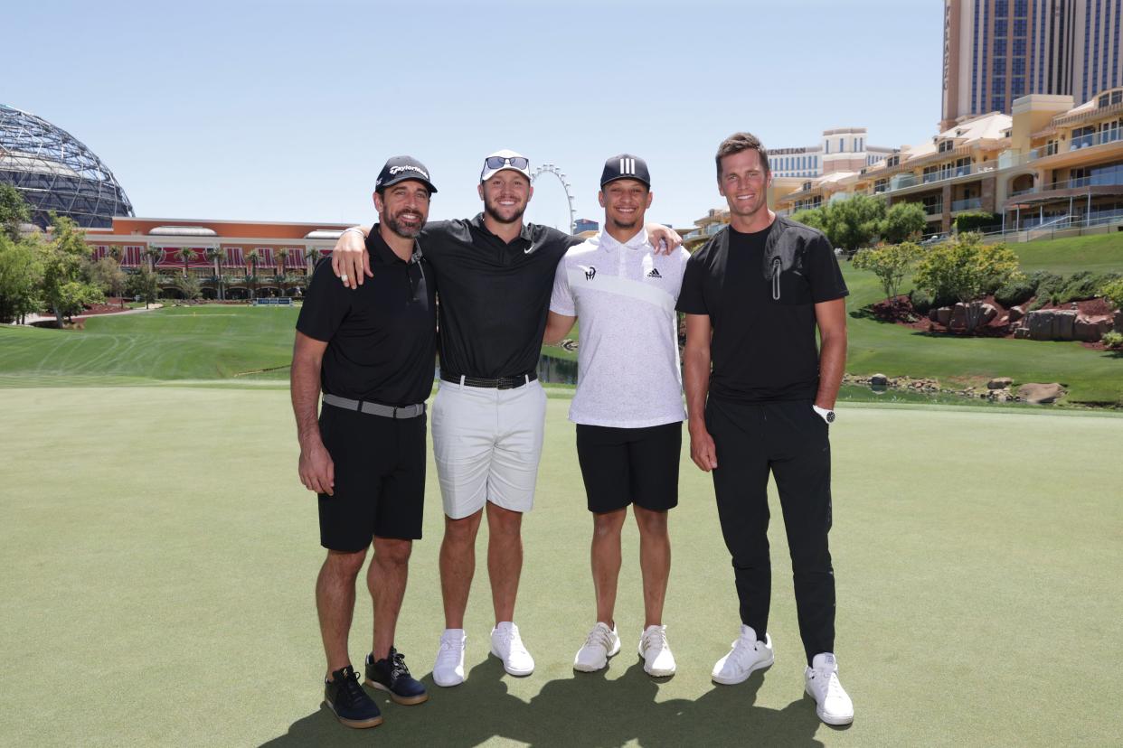 Aaron Rodgers, Josh Allen, Patrick Mahomes and Tom Brady pose for a photo before The Match VI.