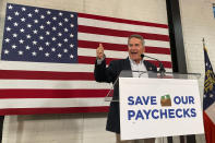 U.S. Rep Jody Hice speaks at an event in Atlanta, on Monday, Sept. 13, 2021, meant to rally opposition to President Joe Biden's economic agenda. Hice's bid for Secretary of State in Georgia has been endorsed by former President Donald Trump. (AP Photo/Jeff Amy)