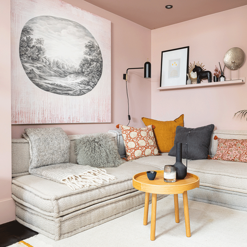 Pink living room with grey sofa