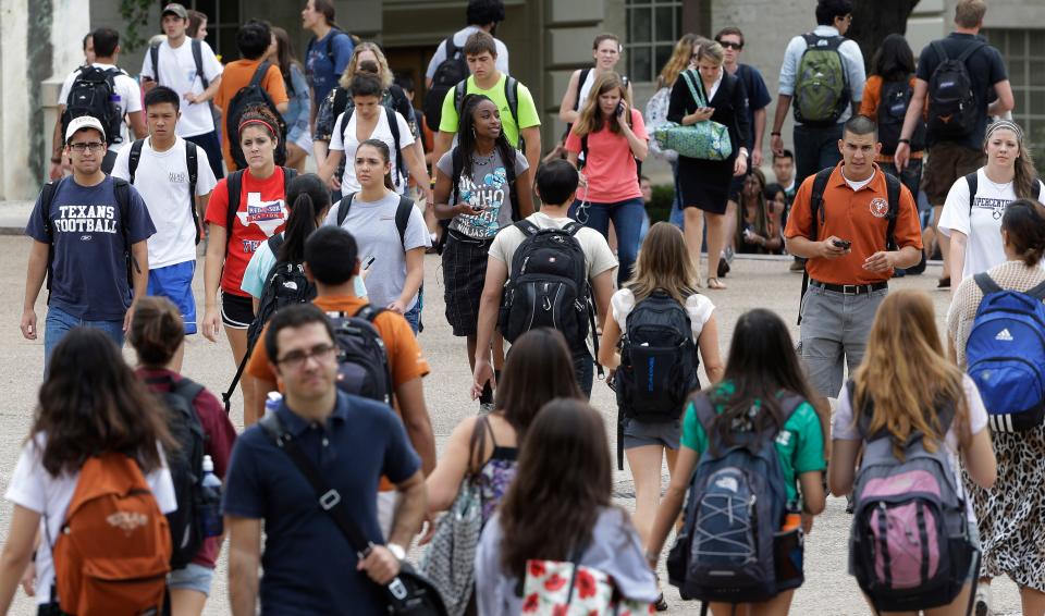 Students walk through the University of Texas at Austin campus in Austin, Texas in 2012.