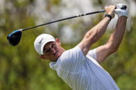 Rory McIlroy watches his tee shot on the second hole during the third round of the Wells Fargo Championship golf tournament at Quail Hollow on Saturday, May 8, 2021, in Charlotte, N.C. (AP Photo/Jacob Kupferman)