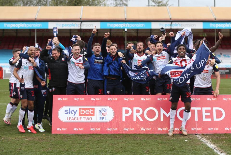 The Bolton News: Wanderers celebrate promotion at Crawley