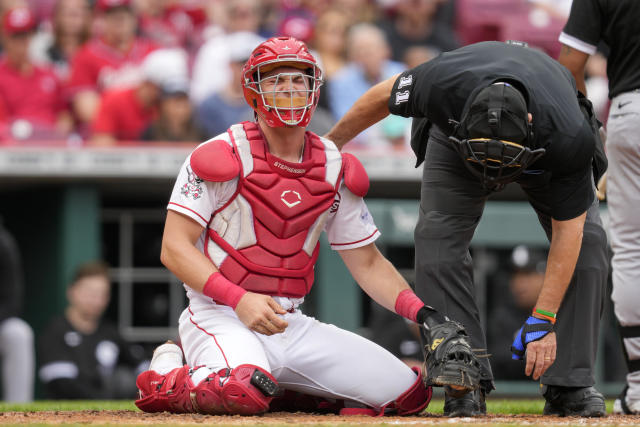 Cincinnati Reds catcher Tyler Stephenson reacts after being hit by a pitch in the second inning of a baseball game against the Chicago White Sox in Cincinnati, Sunday, May 7, 2023. (AP Photo/Jeff Dean)