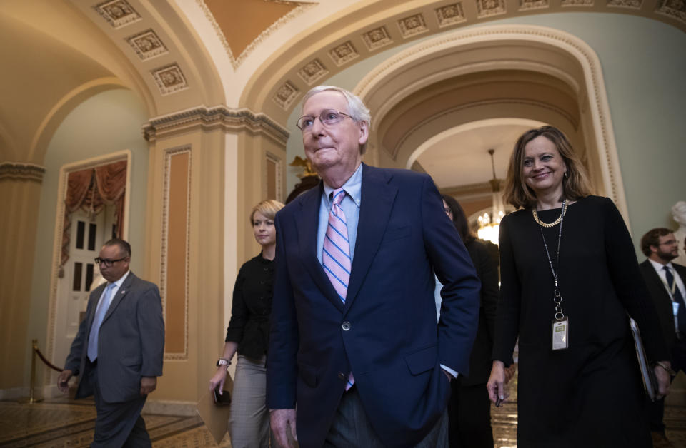 Senate Majority Leader Mitch McConnell, R-Ky., walks to the chamber for the final vote to confirm Supreme Court nominee Brett Kavanaugh, at the Capitol in Washington, Saturday, Oct. 6, 2018. (AP Photo/J. Scott Applewhite)