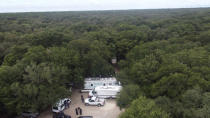 In this photo provided by North Port Police Department, law enforcement officials conduct a search of the vast Carlton Reserve in the Sarasota, Fla., area for Brian Laundrie on Saturday, Sept. 18, 2021. Laundrie is a person of interest in the disappearance of his girlfriend, Gabrielle “Gabby” Petito. (North Port Police Department via AP)