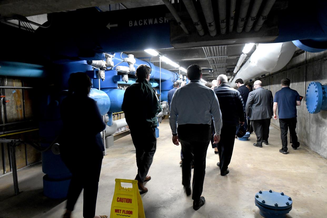Federal and local officials tour the Northeast Water Treatment Plant on Thursday to highlight the multimillion-dollar improvements that have been made to Canton's water treatment facilities to help protect drinking water quality for Canton's water customers.