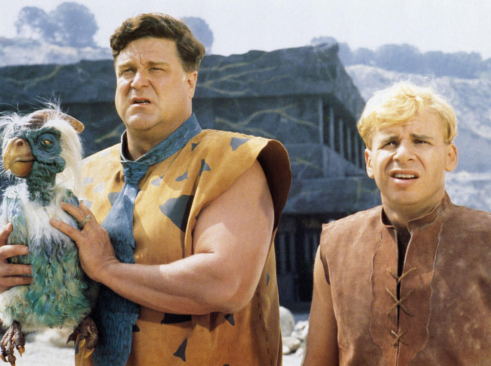 John Goodman and Rick Moranis were joined by many prehistoric creatures on screen in The Flintstones. (Alamy)