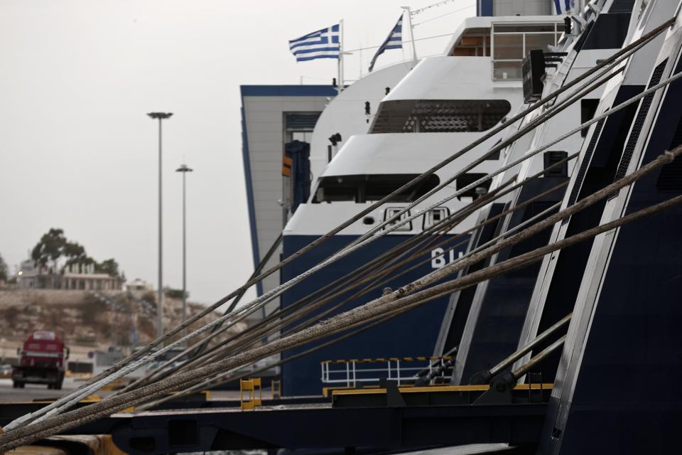 Ships are seen anchored during a 24-hour general labour strike at the port of Piraeus near Athens