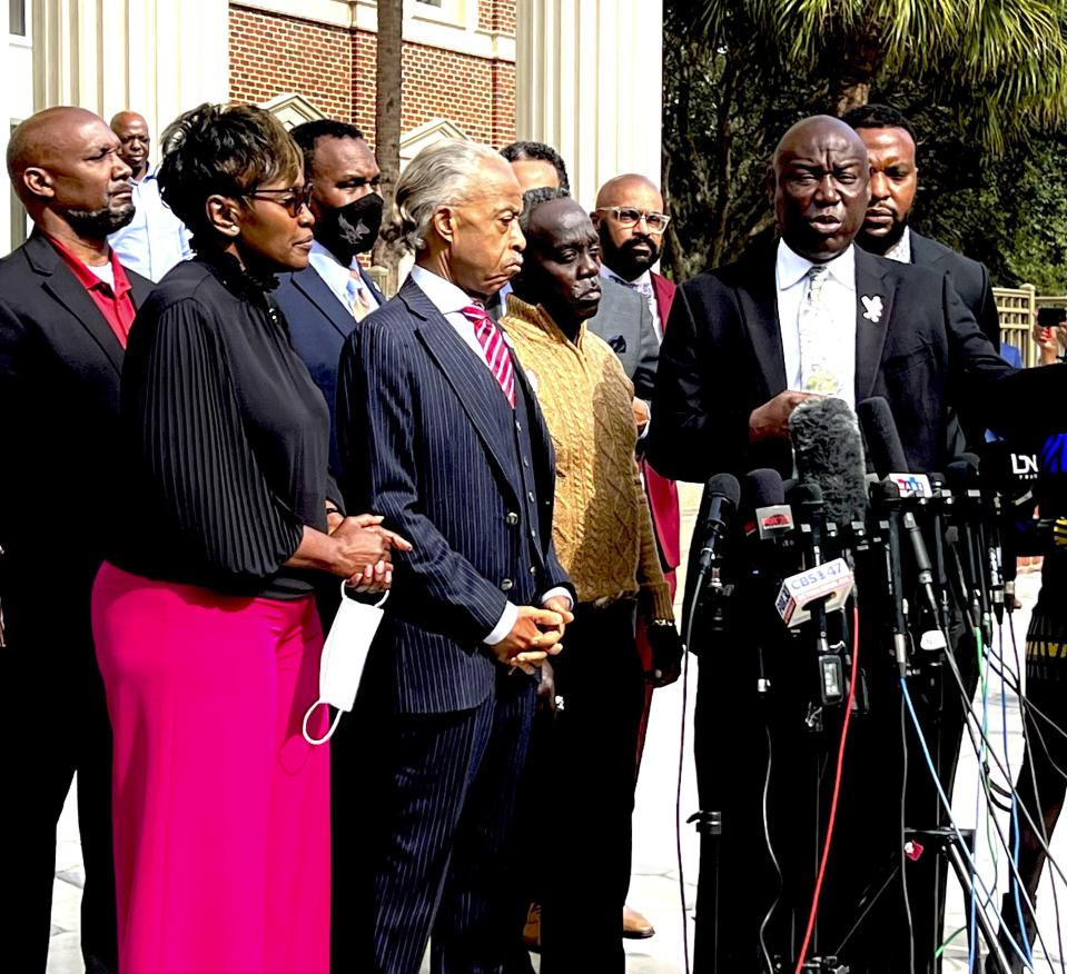 The Reverend Al Sharpton of the National Action Network holds a news conference at the Glynn County courthouse during the trial of Greg McMichael and his son, Travis McMichael, and a neighbor, William "Roddie" Bryan, Wednesday, Nov. 10, 2021, in Brunswick, Ga. The three are charged with the February 2020 slaying of 25-year-old Ahmaud Arbery. (AP Photo/Lewis M. Levine)