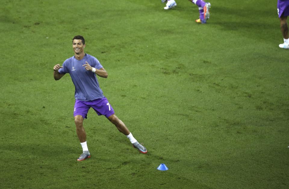 <p>Real Madrid’s Cristiano Ronaldo warms up before the match </p>