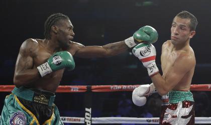 Nicholas Walters throws a punch at Alberto Garza in November 2013 (AP)