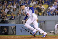 Los Angeles Dodgers' Freddie Freeman drops his bat as he hits an RBI double during the fifth inning of a baseball game against the Arizona Diamondbacks Monday, May 16, 2022, in Los Angeles. (AP Photo/Mark J. Terrill)