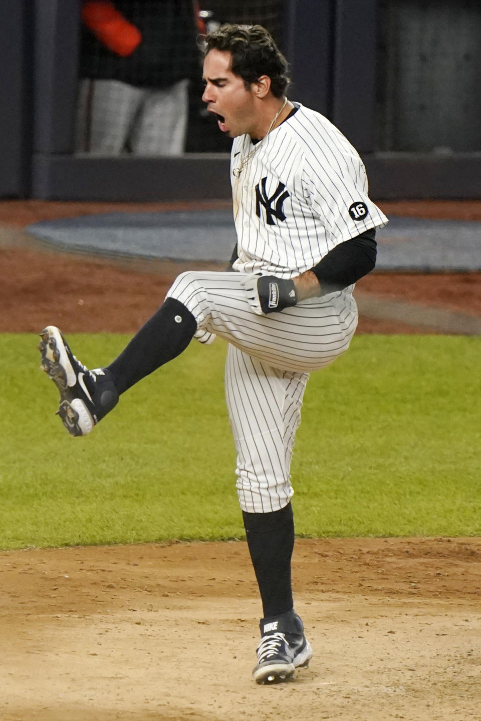 New York Yankees pinch runner Mike Tauchman reacts after scoring the game-trying run during the eighth inning of a baseball game against the Baltimore Orioles, Wednesday, April 7, 2021, at Yankee Stadium in New York. (AP Photo/Kathy Willens)