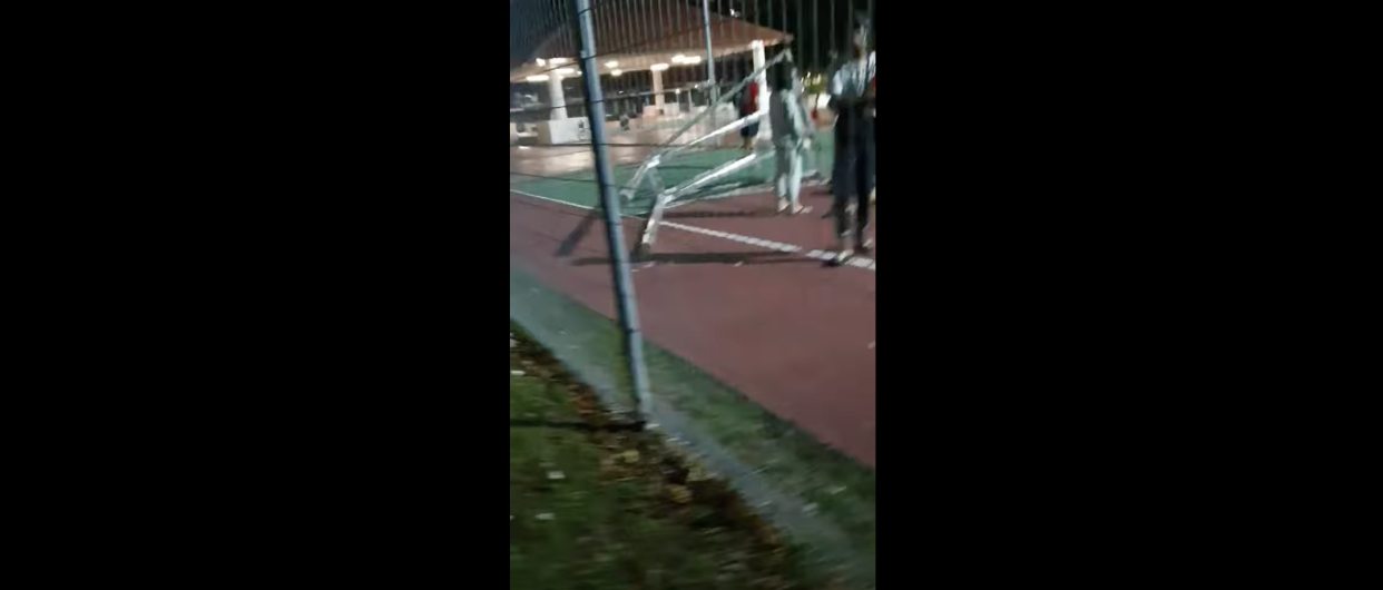 The fallen basketball hoop structure near Block 18 Bedok South Road. (PHOTO: YouTube Screengrab)