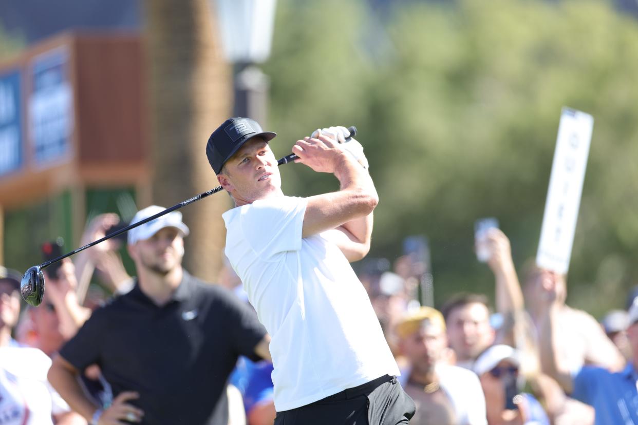 Tom Brady plays a shot during The Match VI.