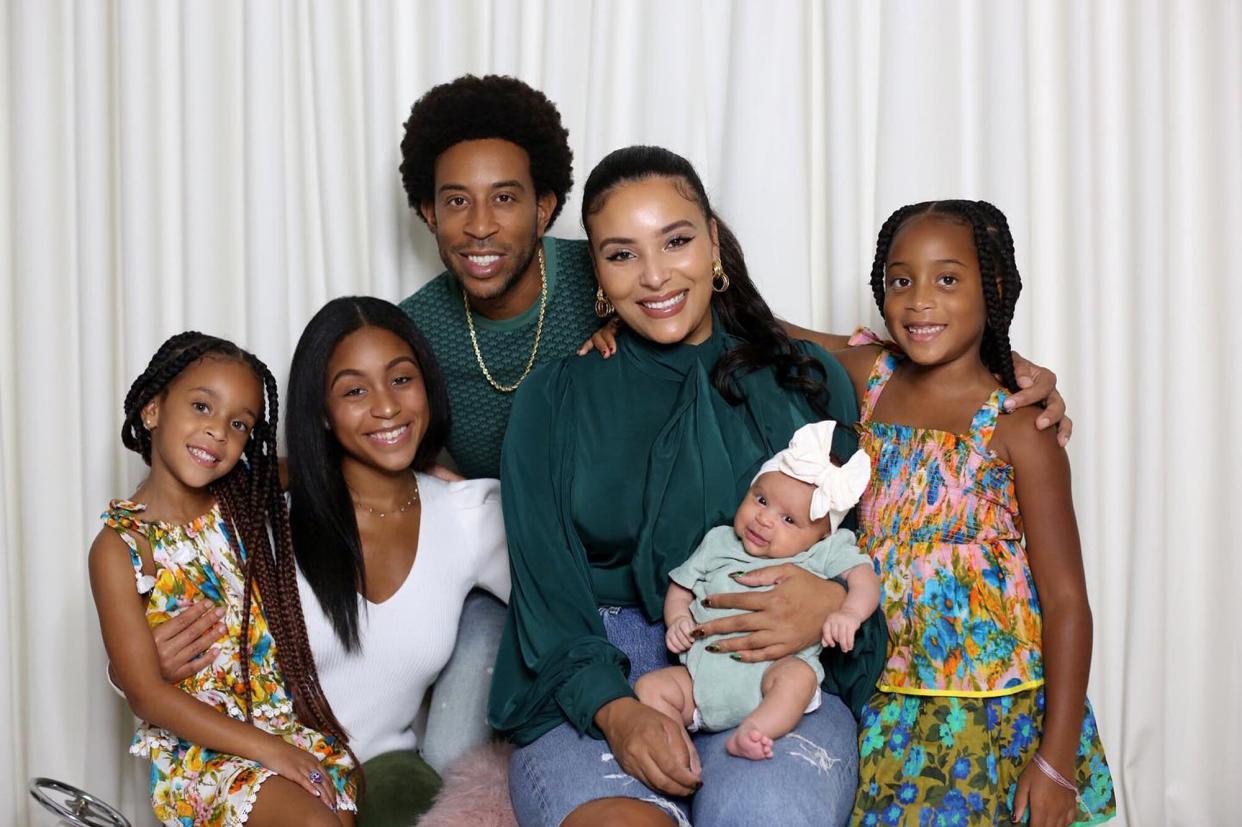Ludacris, Eudoxie Mbouguiengue, and family