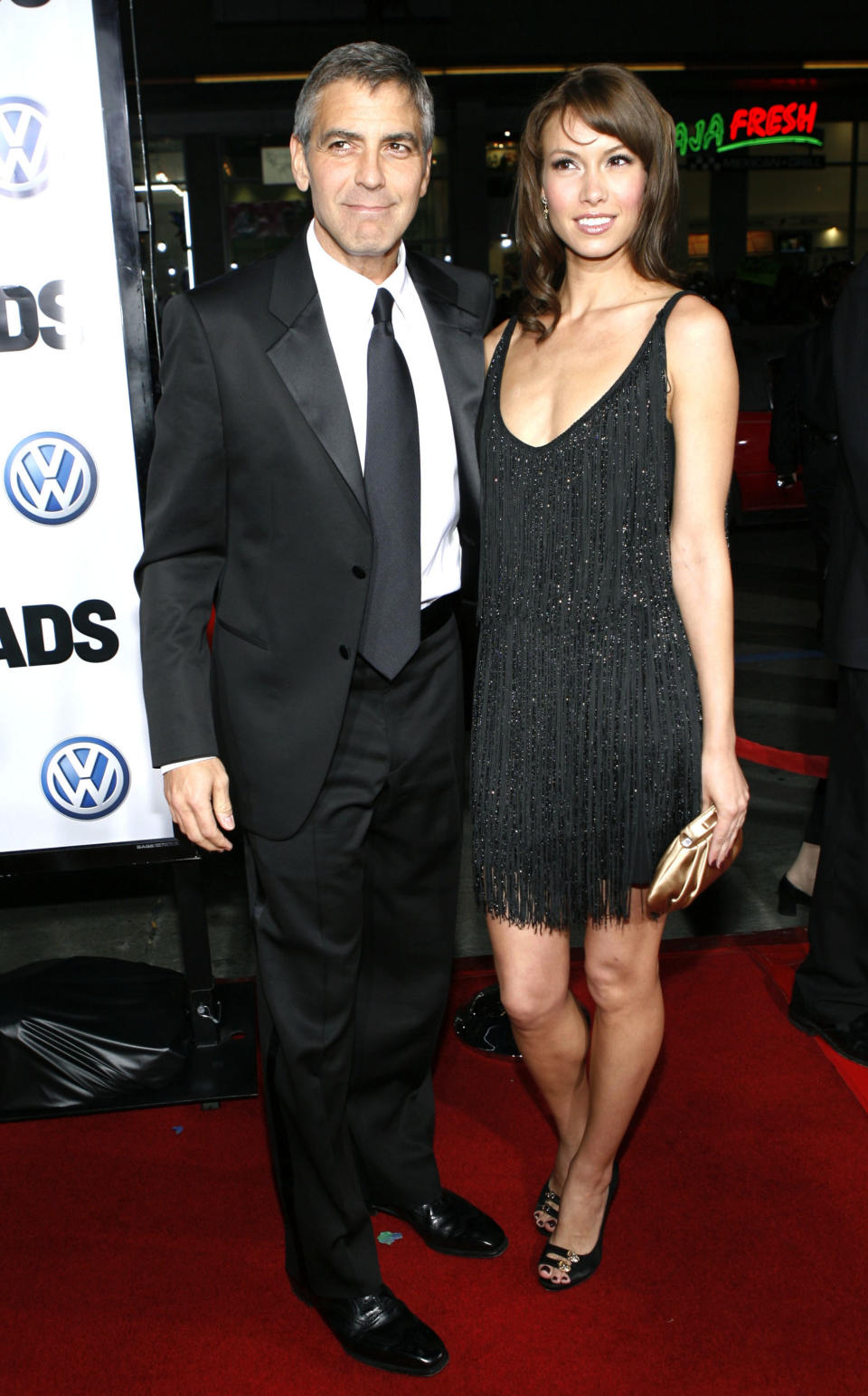 FILE - In this March 11, 2008 file photo, George Clooney, left, and Sarah Larson arrive at the premiere of "Leatherheads" in Los Angeles. Clooney, 52, Hollywood’s most determined bachelor famous for a litany of fleeting loves, including Larson, has taken himself off the romantic market and proposed to 36-year-old attorney, Amal Alamuddin. A spokesman for the Oscar-winning actor and producer did not respond to requests for comment Monday, April 28, 2014. (AP Photo/Matt Sayles, file)