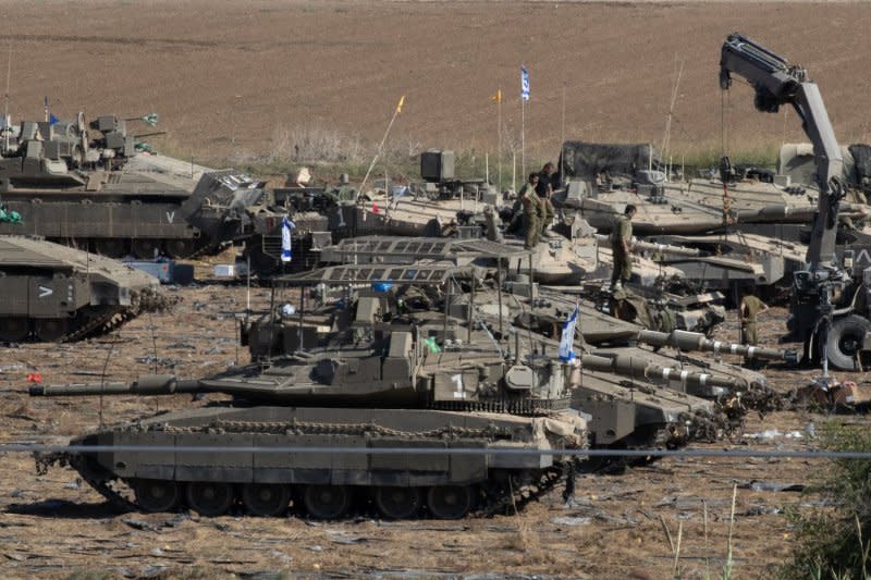 Israel Defense Forces Merkava tanks in a staging area in southern Israel near the border with the Gaza Strip on Wednesday ahead of a possible ground invasion of Gaza. Photo by Jim Hollander/UPI