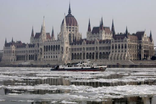 The biggest Hungarian icebreaker for rivers the 40-meter-long 'Szechenyi', moves and navigates through the ice-covered waters of the Danube River nearby the parliament building in Budapest. The country closed the river to due to thick ice, bringing shipping to a near standstill on Europe's busiest waterway, as the continent's cold snap death toll passed 540
