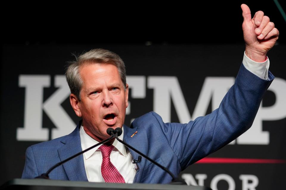 Republican Gov. Brian Kemp waves to supporters during an election night watch party, Tuesday, May 24, 2022, in Atlanta. Kemp easily turned back a GOP primary challenge Tuesday from former U.S. Sen. David Perdue, who was backed by former President Donald Trump.