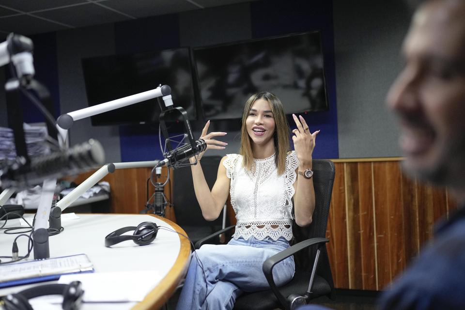 Sofia Salomon gives an interview at a radio program in Caracas, Venezuela, Tuesday, May 30, 2023. The influencer and Instagram model has applied to take part in this year’s Miss Venezuela contest. If accepted, she will be the first transgender woman to participate. (AP Photo/Matias Delacroix)