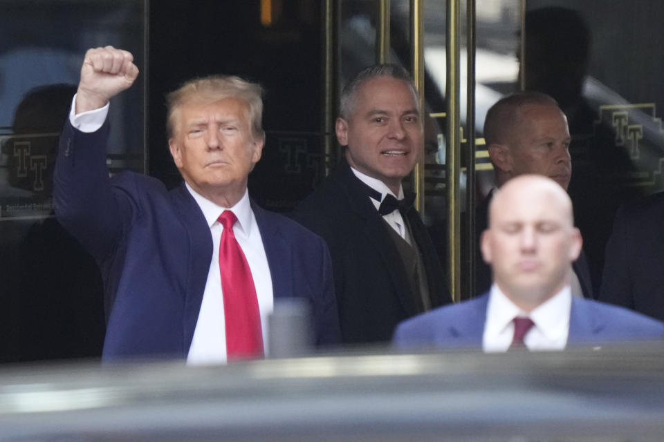 FILE - Former President Donald Trump leaves Trump Tower in New York on Tuesday, April 4, 2023. Only 4 in 10 U.S. adults believe Trump acted illegally in New York, where he has been charged in connection with hush money payments made to women who alleged sexual encounters, according to a new poll by The Associated Press-NORC Center for Public Affairs Research. More — about half — believe he broke the law in Georgia, where he is under investigation for interfering in the 2020 election vote count. (AP Photo/Bryan Woolston, File)