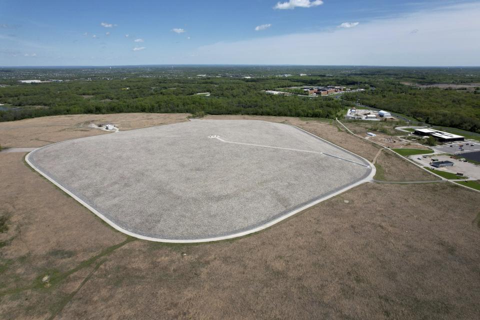 Weldon Spring disposal cell, 41-acre structure built to contain chemical and radiological waste, is visible on Friday, April 21, 2023, in Weldon Spring, Mo. The government said the site is safe, but some local residents still worry. (AP Photo/Jeff Roberson)