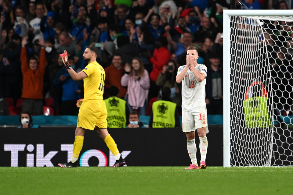 LONDON, ENGLAND - JULY 06: Dani Olmo of Spain reacts after missing their side's first penalty in the penalty shoot out during the UEFA Euro 2020 Championship Semi-final match between Italy and Spain at Wembley Stadium on July 06, 2021 in London, England. (Photo by Andy Rain - Pool/Getty Images)