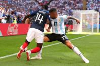 <p>Nicolas Otamendi puts the breakes on Blaise Matuidi </p>