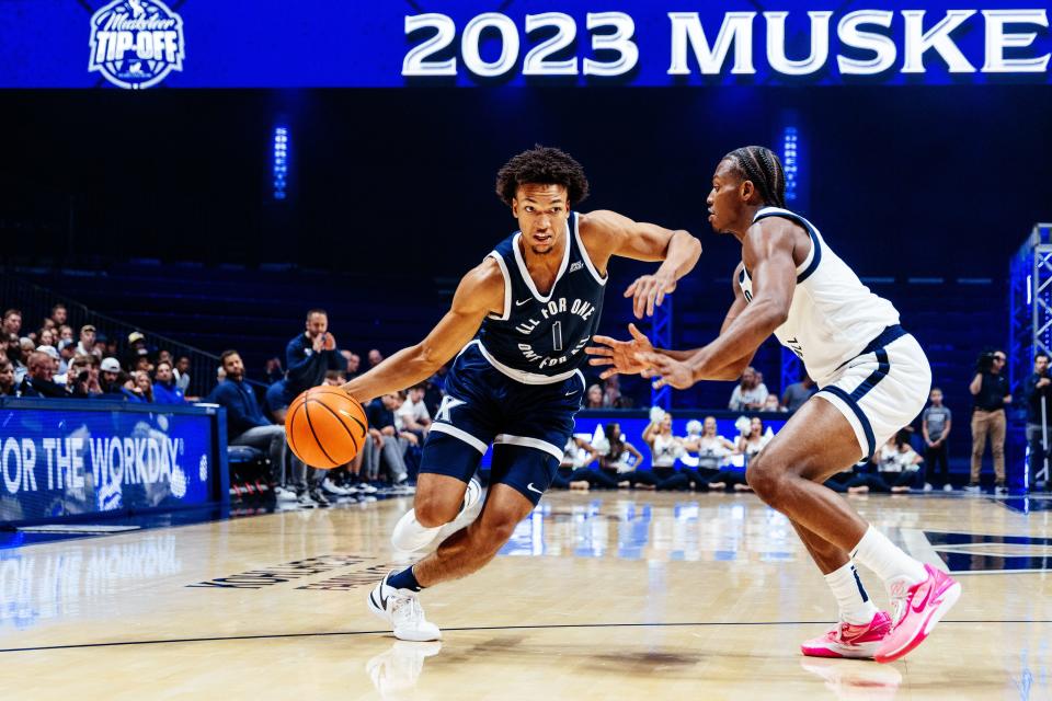 Xavier sophomore guard Desmond Claude (left) had 15 points in Xavier Blue's 74-60 win over Xavier White at Musketeer Tip-Off at Cintas Center Friday, Oct. 13, 2023.