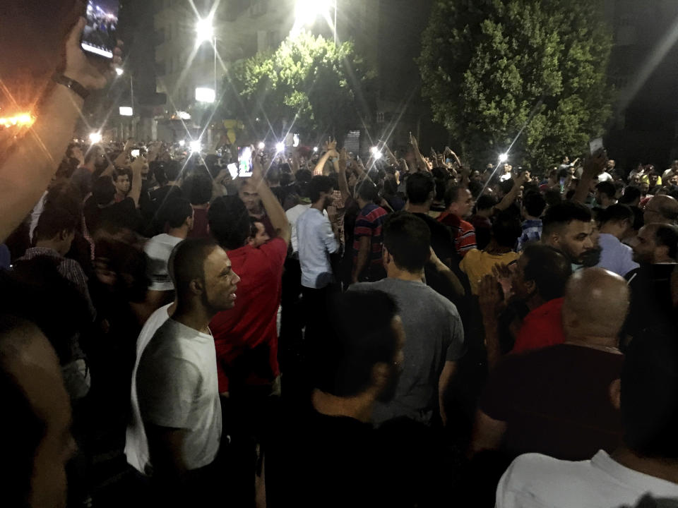 Protesters chant slogans against the regime in Cairo, Egypt, early Saturday, Sept. 21, 2019. Dozens of people held a rare protest in Cairo during which they called on Egyptian President Abdel-Fattah el-Sissi to quit. Security forces dispersed the protesters and no casualties were reported. (AP Photo/Nariman El-Mofty)