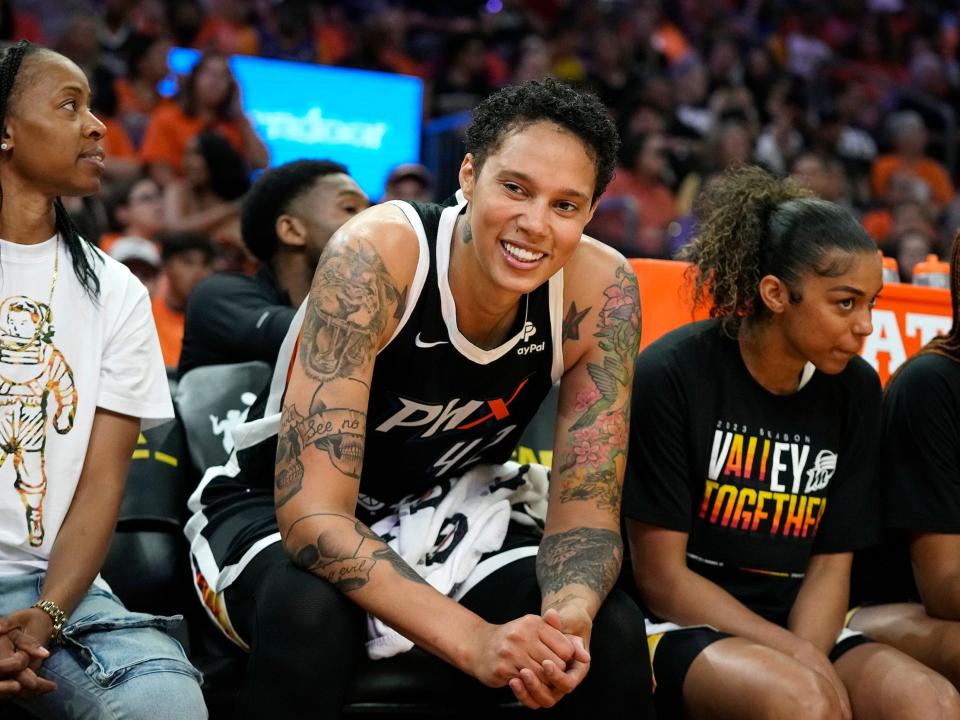 Brittney Griner smiles during her return to Phoenix's Footprint Center.