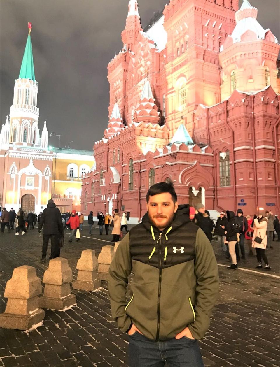 This 2018 image provided by the Reed family shows Trevor Reed at Red Square in Moscow, Russia. Russia is holding Marine veteran Trevor Reed, who was sentenced to nine years on charges he assaulted a police officer. (Reed Family via AP)
