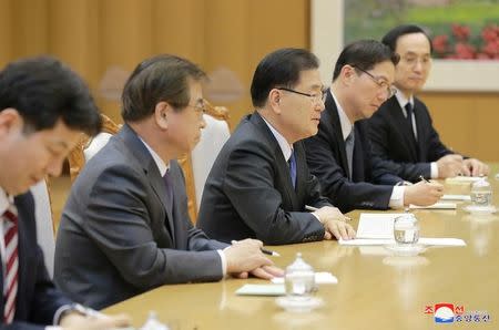 North Korean leader Kim Jong Un (not in picture) meets members of the special delegation of South Korea's President in this photo released by North Korea's Korean Central News Agency (KCNA) on March 6, 2018. KCNA/via Reuters